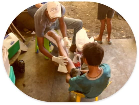 Medical workers and children at community health clinic in Honduras (1 of 2)